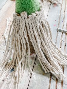 cut and glue on dollar tree mop