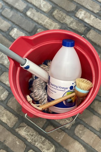 how to clean brick flooring - cleaning vinegar, bucket, hot water, mop, scrubber brush