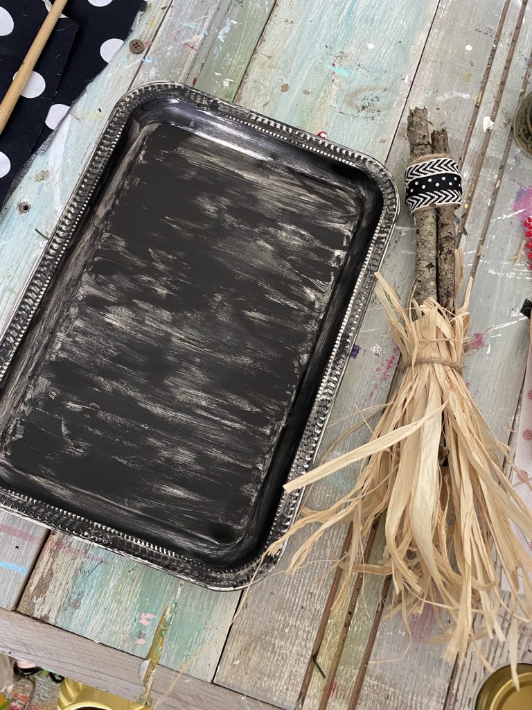 Paint the dollar tree tray black