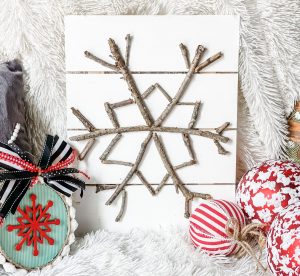 diy stick snowflake sign