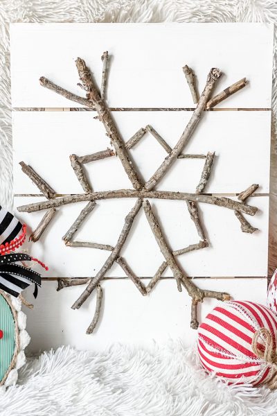 diy stick snowflake sign