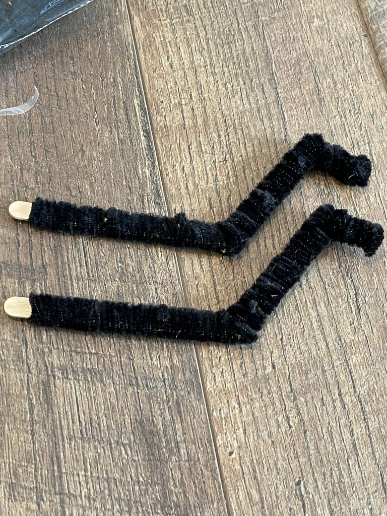 wrap pipe cleaners around the legs