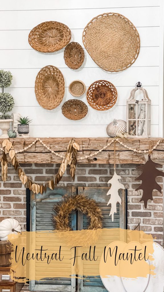 pinterest image for fall mantel decorated with baskets and neutral elements