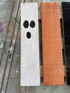 paint a face on each slat - the ghost is on the white slat