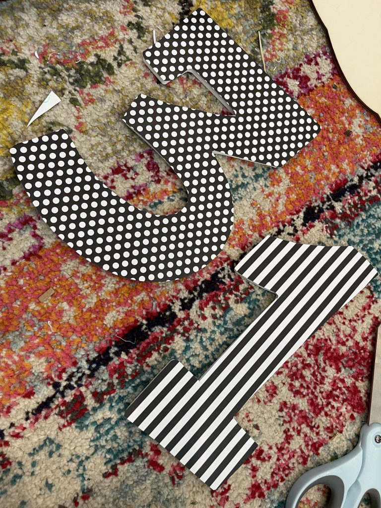 cover your numbers with scrapbook paper