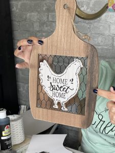 dry brush your sign with black paint