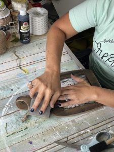 sand your sign after painting