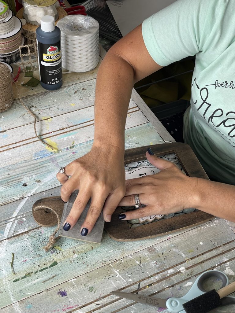 sand your sign after painting