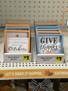 mini fall signs at Dollar General