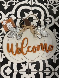 before of the welcome pumpkin door hanger from big lots