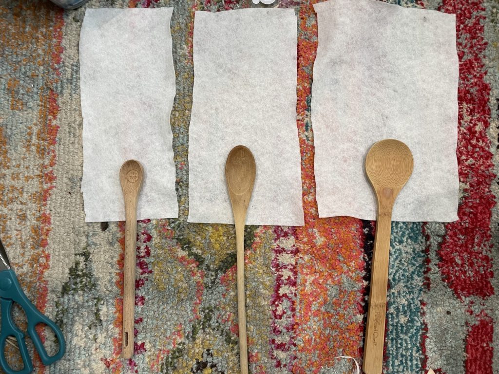 cut strips of white felt from dollar tree to fit each spoon