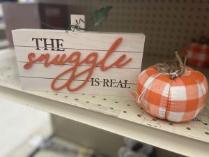 the snuggle is real sign and orange buffalo check pumpkin