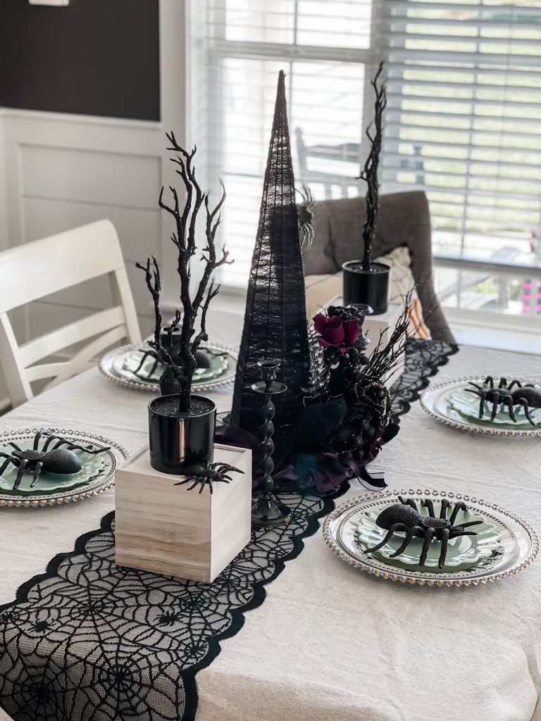 view of halloween tablescape on dining tablee