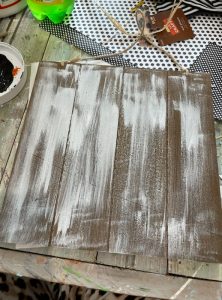 White wash your board by brushing on white paint