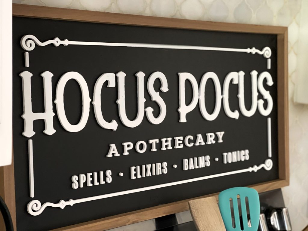 hocus pocus sign above stove