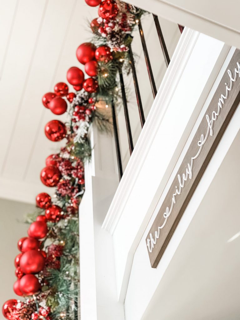 garland hanging on stairwell