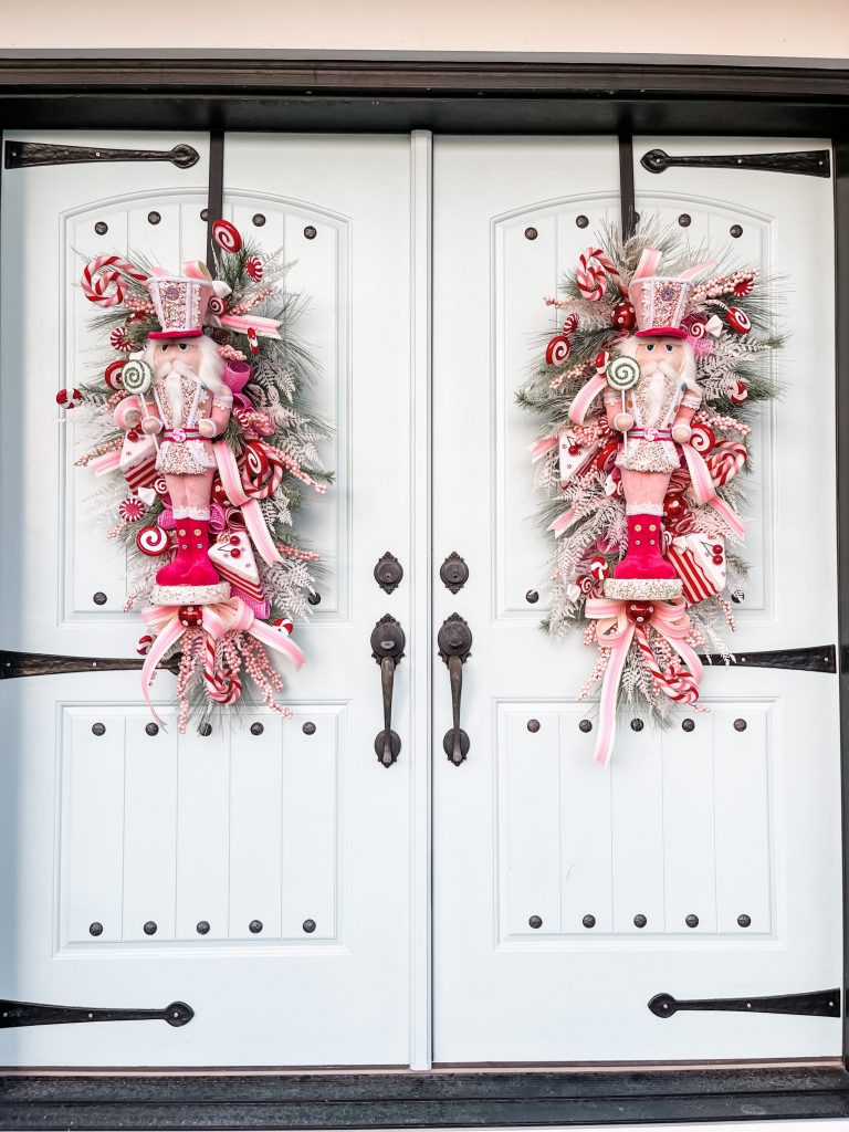 pink and red nutcracker wreath on front door