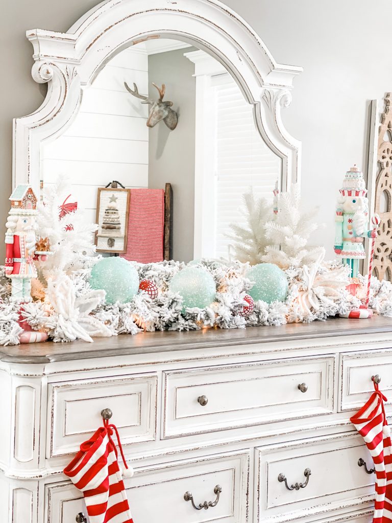 christmas decorated dresser in bedroom