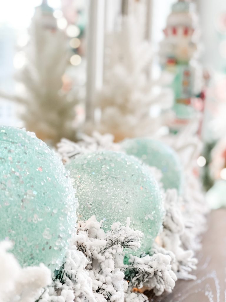 flocked christmas garland on dresser