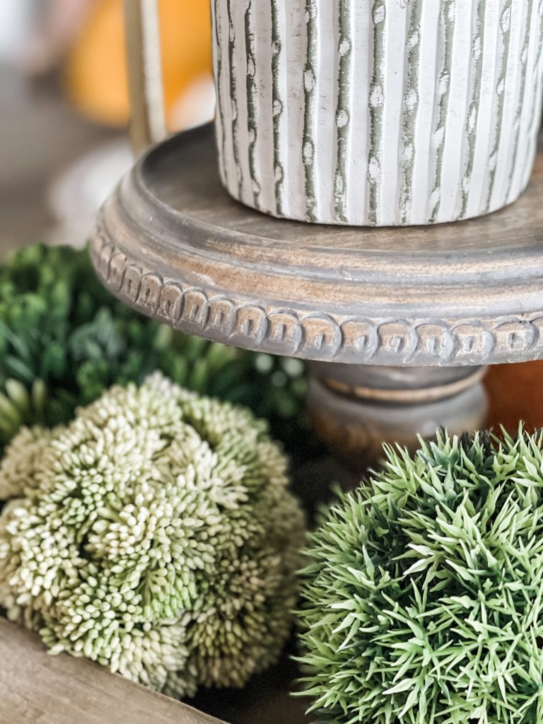 faux greenery on dining table