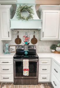 cutting boards hanging over stove