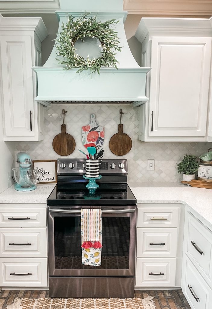 cutting boards hanging over stove