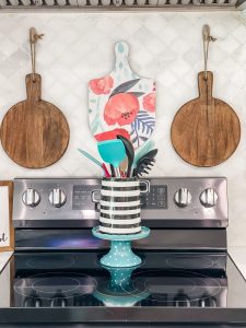 cutting boards hanging over stove
