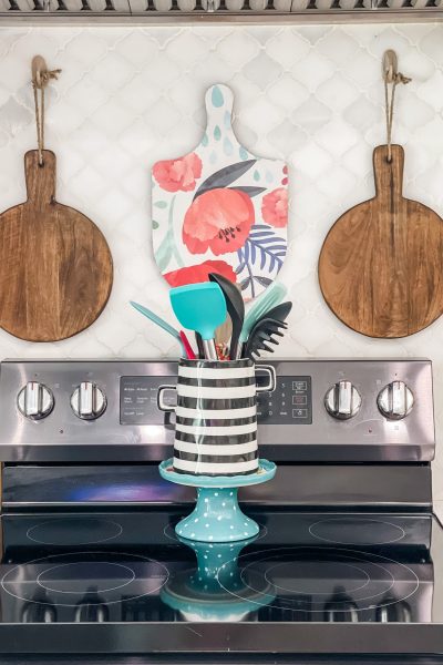 cutting boards hanging over stove