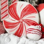 painting a pink and red peppermint