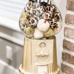 gumball machine filled with pumpkins