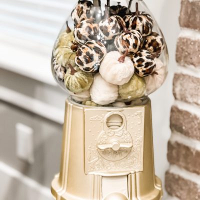 gumball machine filled with pumpkins